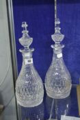 Pair of cut glass decanters with stoppers, mallet shaped, 34cm high (2).