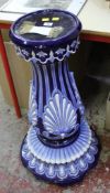 A 20th century jardinière stand, decorated in two-tone blue and white relief decoration, 83cm high