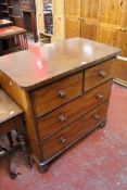 A Victorian mahogany chest of two short and two long drawers, an Edwardian dressing table, and
