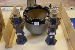 A pair of Doulton Lambeth stoneware vases, blue glaze, with stylised dragon shaped handles, marked