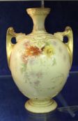 A Royal Worcester blush ivory two-handled vase, circa 1900, decorated with floral sprays and gilt