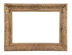 A carved and gilt wood Louis XIV style frame 19th century overall dimensions: 21 1/2 x 28 3/4 in.,