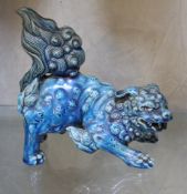 A Chinese blue glazed earthenware model Dog of Fo, approximately 15cm in diameter.