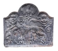 A Victorian cast iron arched fireback centred by a lion dated 1644 71cm high, 80cm wide