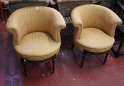 A pair of mahogany tub chairs with upholstered seats circa 1920