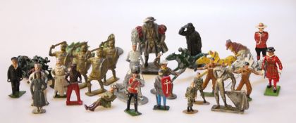 A collection of Dinky and Corgi tanks, military vehicles, cannons and die cast soldiers.