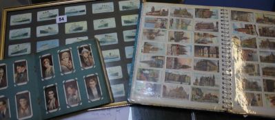 [Cigarette cards] - An assortment of cigarette cards within two albums and some framed. Best Bid