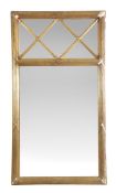 A giltwood and composition wall mirror, circa 1825, possibly Danish or Swedish, the reeded
