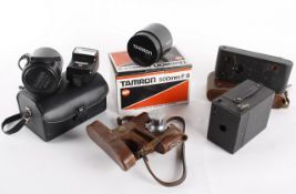 A Leica `E` Standard camera, chrome model, No. 251439, with Elmar 5cm F 3.5 lens; together with a