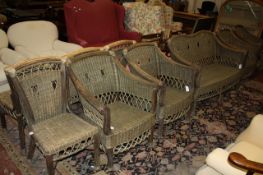 A set of wicker furniture, comprising four armchairs, four side chairs and a settee