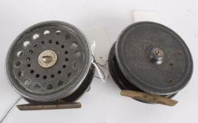 An Ogden Smith "Exchequer" 3 1/2 inch alloy reel, with perforated drum, horn handle and brass