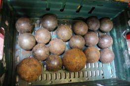 Sixteen cast iron six-pounder cannon balls, 19th century and later, each 3.49 inches in diameter