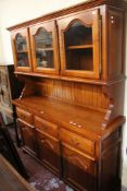 A French provincial style cherrywood glazed dresser.193cm high, 155cm wide