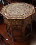 A Moorish marquetry occasional table with bone inlay, early 20th century