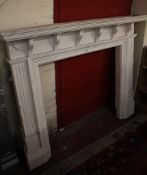 A George III style painted wood fire surround 134cm high, 163cm wide