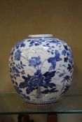 A 20th century Chinese blue and white ginger jar, (missing lid) 22cm high.