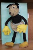 A mid 20th century felt Minnie Mouse, with wired articulated arms and legs, 34cm approx.
