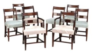 A set of five George III mahogany dining chairs circa 1800 each with outswept top rail and pierced