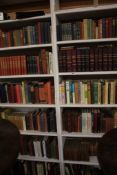 Twelve shelves of books including eighteen volumes of the Windsor Shakespeare, twenty seven
