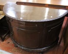 An 18th century style mahogany demi-lune side cabinet 131cm wide