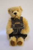 A Hermann Original teddy `Leopold` - a gold plush bear wearing Lederhosen, limited edition 87/5000