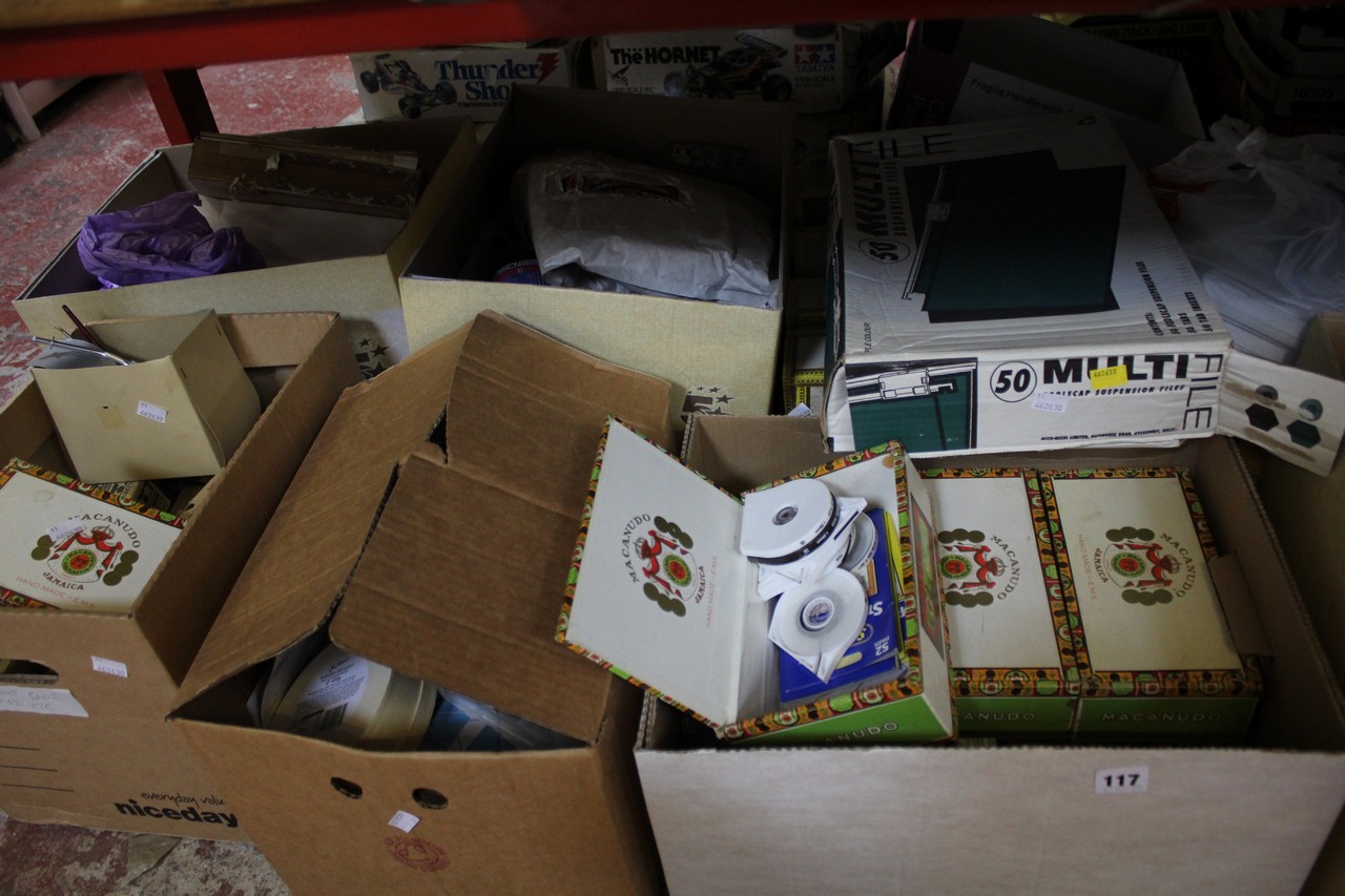 A large quantity of model making accessories, paints, transfers, electric motors, nuts and bolts