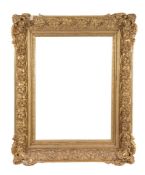 A 20th century gilt composition frame in c.1700 style overall dimensions: 41 x 52 1/2 in., 104.2 x