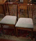 A set of four chairs with vertical splat and padded seat  Best Bid