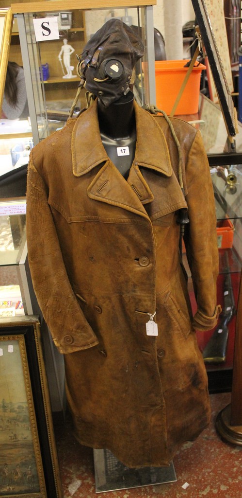 A Royal Air Force Type `C` leather flying helmet, AM marked, complete with loom (A/F), a cotton