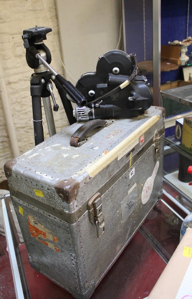 An Arriflex 16mm motion film camera, made in West Germany, with extra lenses, tripod, complete