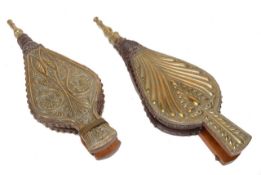 Two pairs of repousse brass mounted fruitwood hearthside bellows, 19th century, each with leather