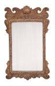 A carved and gilt composition framed wall mirror in George II style, late 19th century, the