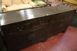 A Chinese elm side cabinet 192cm length