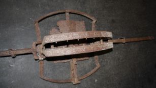 An iron man-trap. 178cm long