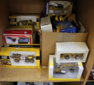 A collection of 1.50 scale diecast CAT utility vehicles, 725 Articulated Truck, 420D IT Backhoe