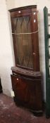 A George III style mahogany and glazed corner cabinet, late 20th century