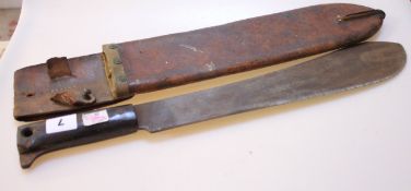 A Second World War Military Issue Machete, of typical form complete with its brown leather scabbard,