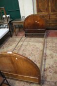 Two mahogany single beds, each with headboard, footboard and two iron rails Best Bid