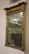 An early 19th Century giltwood wall mirror 83cm high, 66cm
