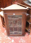 A late Victorian mahogany glazed corner cupboard 86cm high, 59cm wide