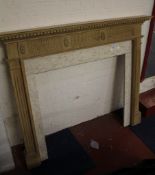 A George III style fire surround with polished stone inserts, 20th century