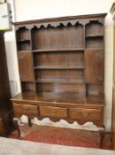 A Welsh oak country dresser, early 20th century in 17th century style 209cm high, 153cm wide