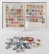 [Stamps] - A stamp album and assorted loose stamps, (qty).