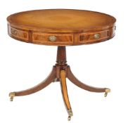 A mahogany and inlaid drum library table in George III style, 20th century, the circular top with