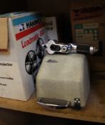 A collection of 8mm Cine Cameras, projectors, screens and other related items.  Best Bid