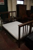 A late Victorian carved oak double bed