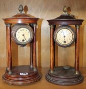 A pair of brass mounted wooden portico clocks floral decorated dials; 31cm high each (2)