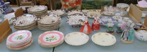 A large quantity of Ridgway `Constantia` dinner plates, soup bowls etc, two Royal Doulton figures `