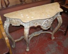 A Continental marble topped parcel gilt carved console table 83cm high, 121cm wide
