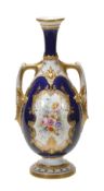 A Royal Worcester blue and gilt two-handled vase in the Sevres style, painted with a panel of